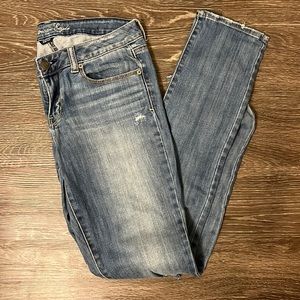 American Eagle medium-wash distressed skinny jean, size 10 long